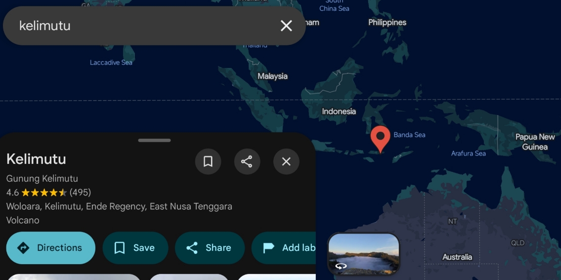 Tangkapan layar aplikasi peta menunjukkan pencarian untuk "kelimutu," dengan penanda lokasi di Pulau Flores, Indonesia.